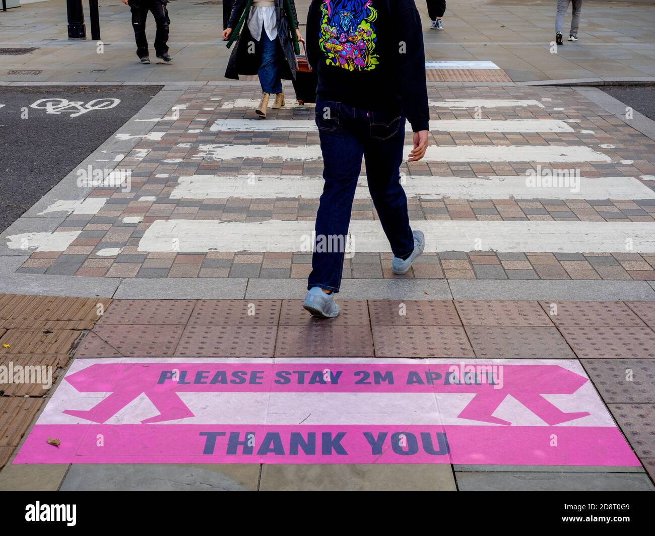 Social distancing advice on Oxford Street dusring the Covid-19 pandemic. Stock Photo