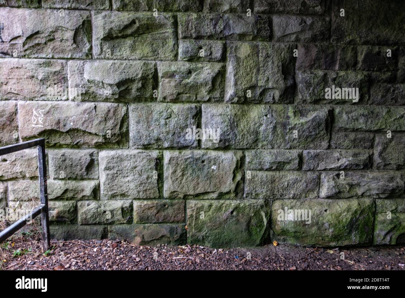 Heavy duty stone built bridge wall Stock Photo