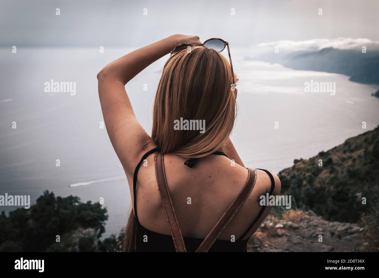 Girl photographing the gulf of Naples Stock Photo