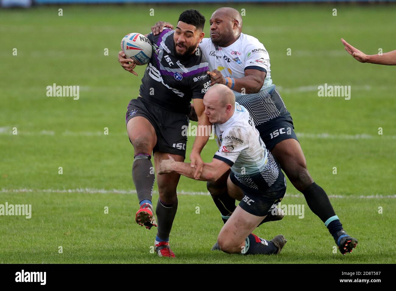 Wakefield Trinity's Kelepi Tanginoa (left) powers through during the Betfred Super League match at the Mobile Rocket Stadium, Wakefield. Stock Photo