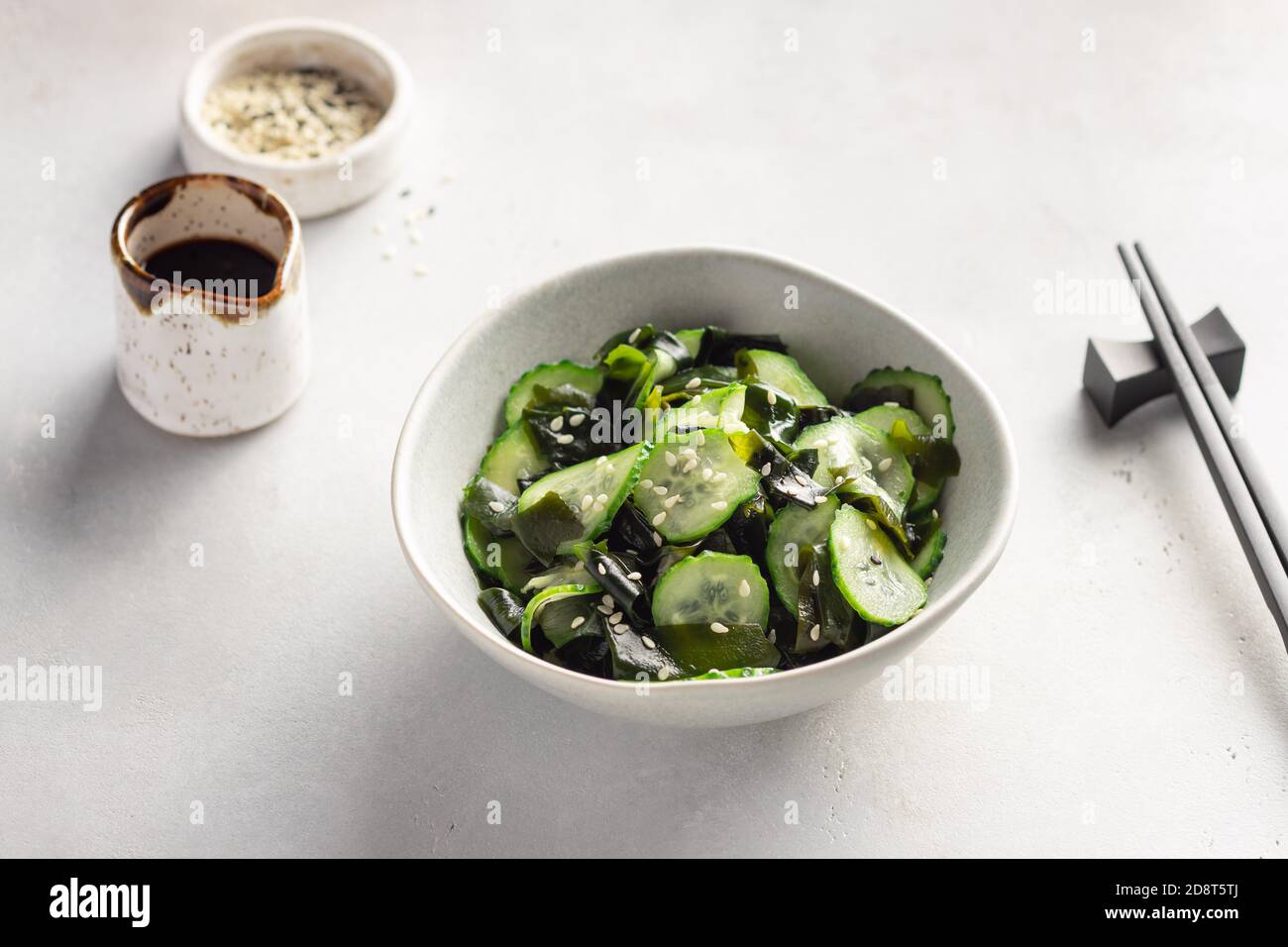 Traditional Japanese Sunomono salad with wakame seaweed, cucumbers and