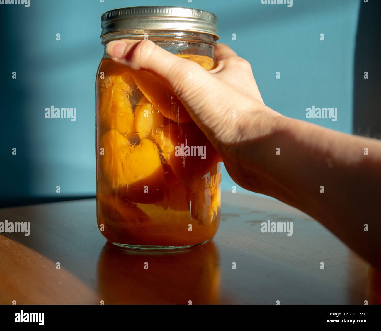 Mason glass jar with canned peaches Stock Photo Alamy
