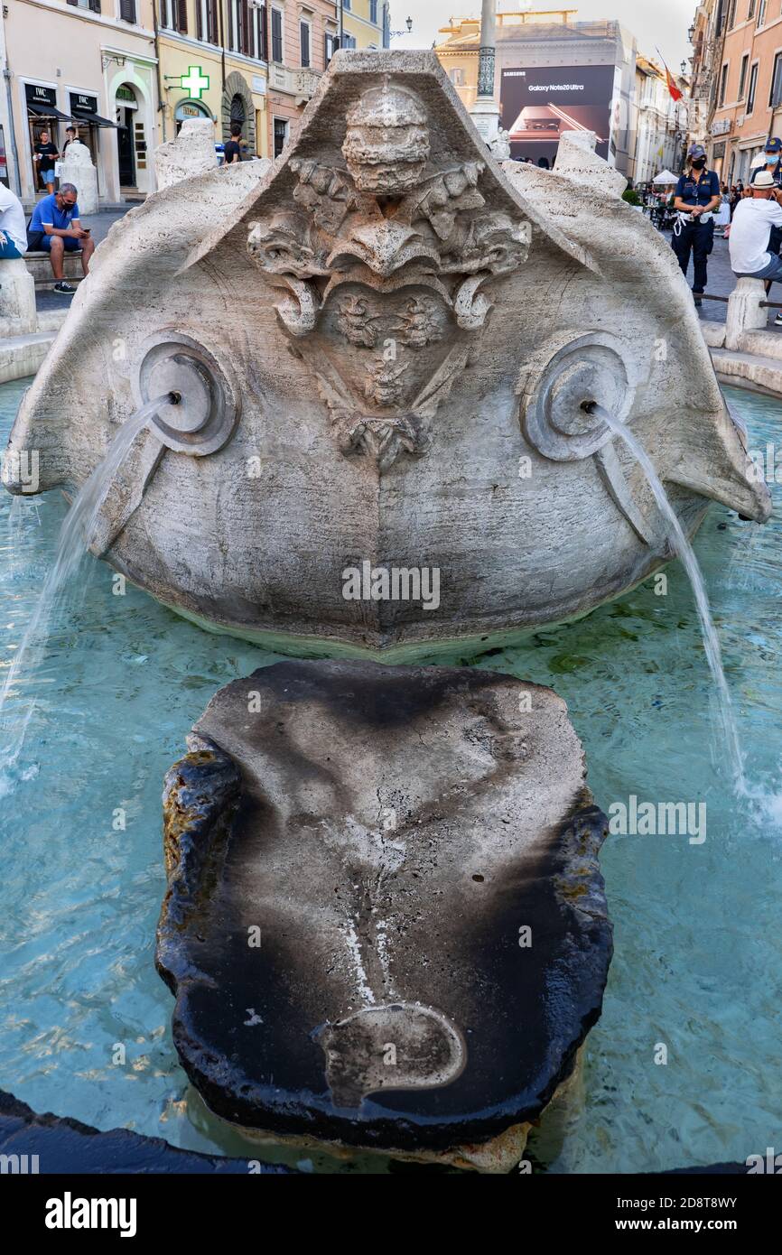 Barcaccia Fountain (Fontana della Barcaccia) with step for drinkable water in Rome, Italy, 17th century landmark by Pietro Bernini Stock Photo