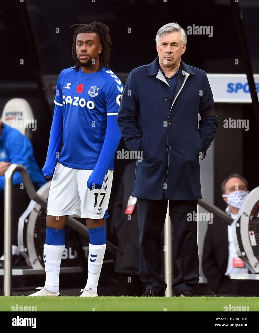 Everton manager Carlo Ancelotti (right) with Alex Iwobi as he prepares to  come on during the Premier League match at St James' Park, Newcastle Stock  Photo - Alamy