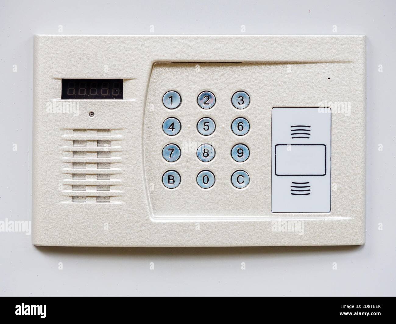 White metal intercom on a white wall. Close-up photo Stock Photo - Alamy