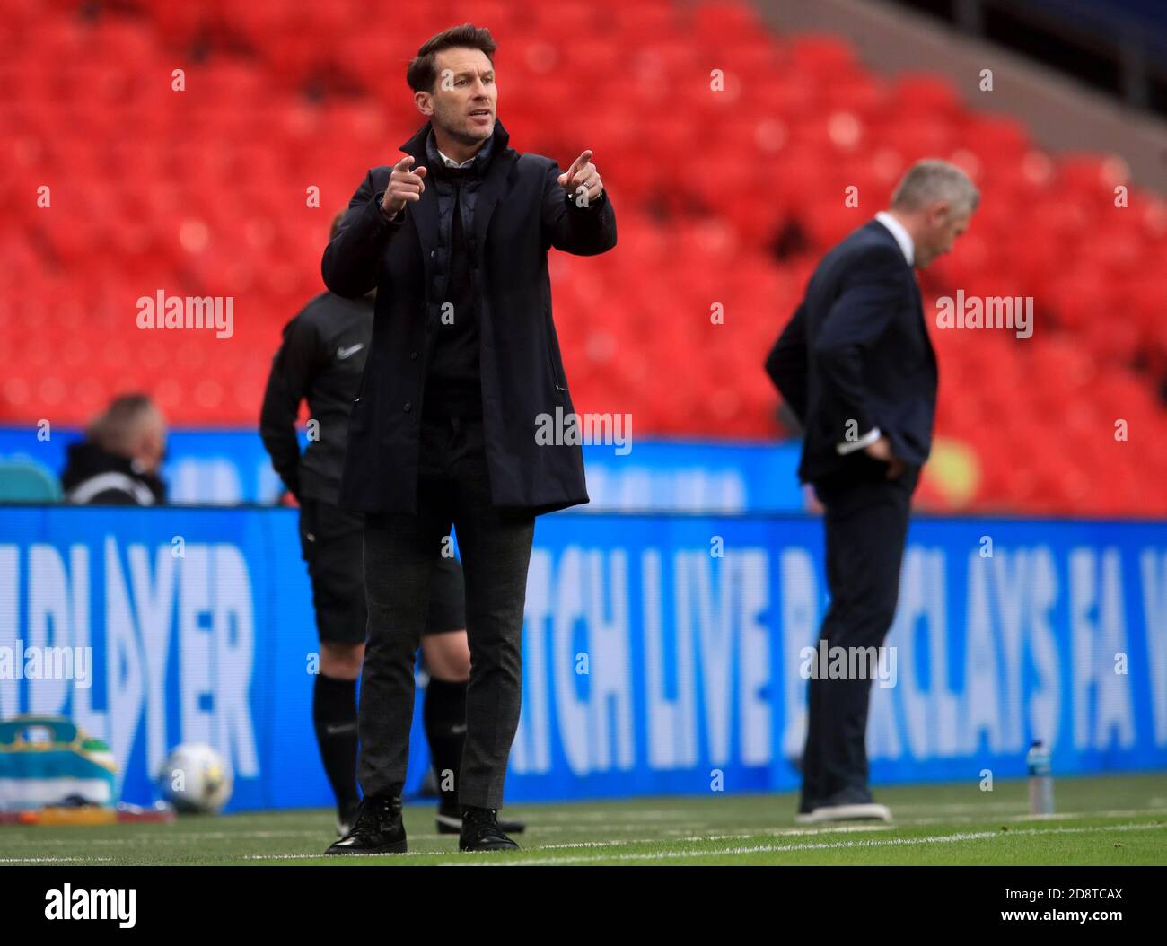 Manchester City manager Gareth Taylor (left) gestures on the touchline during the Women's FA Cup Final at Wembley Stadium, London. Stock Photo