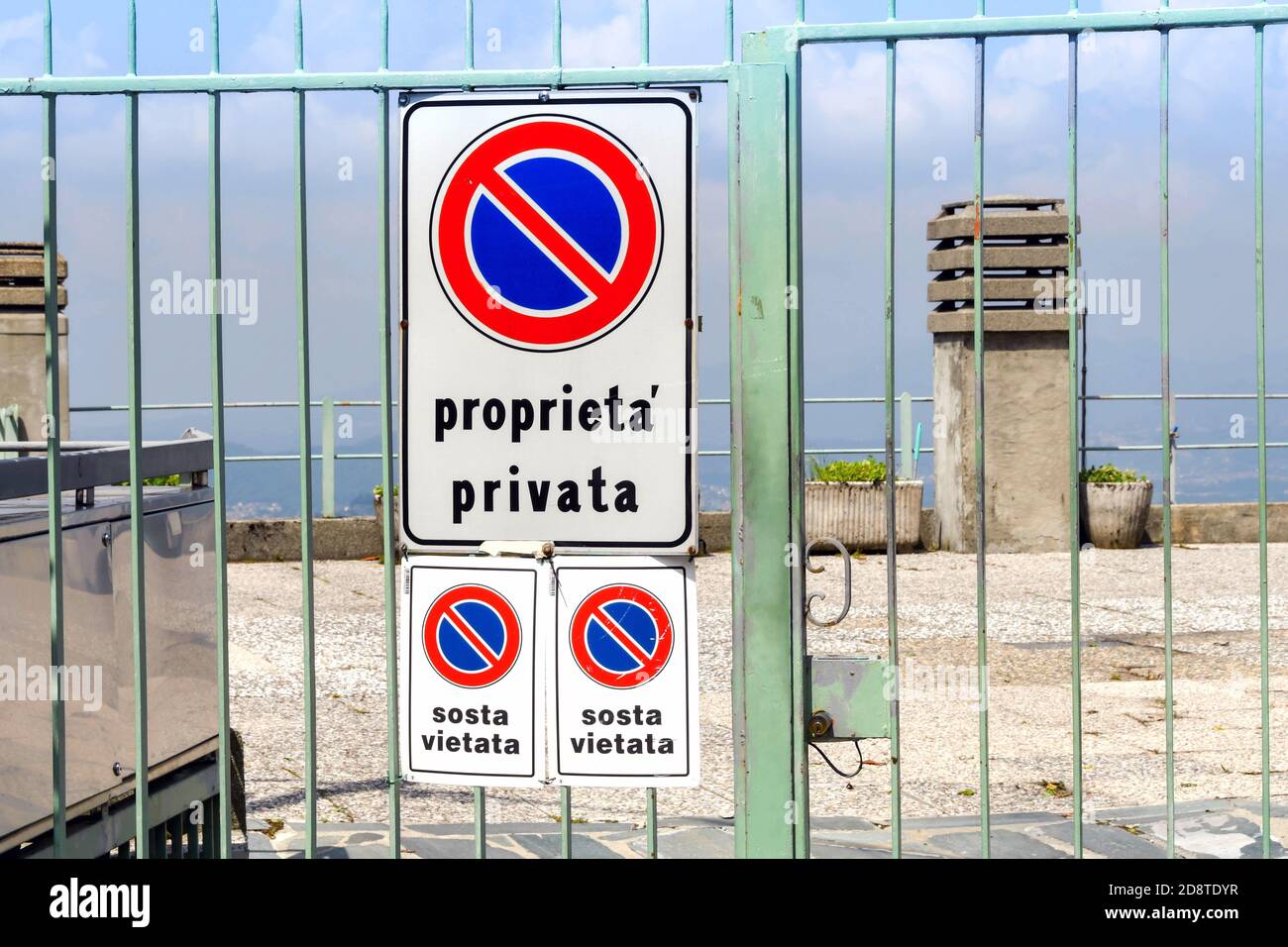 'Private property' sign on the gate outside a home in Italy Stock Photo