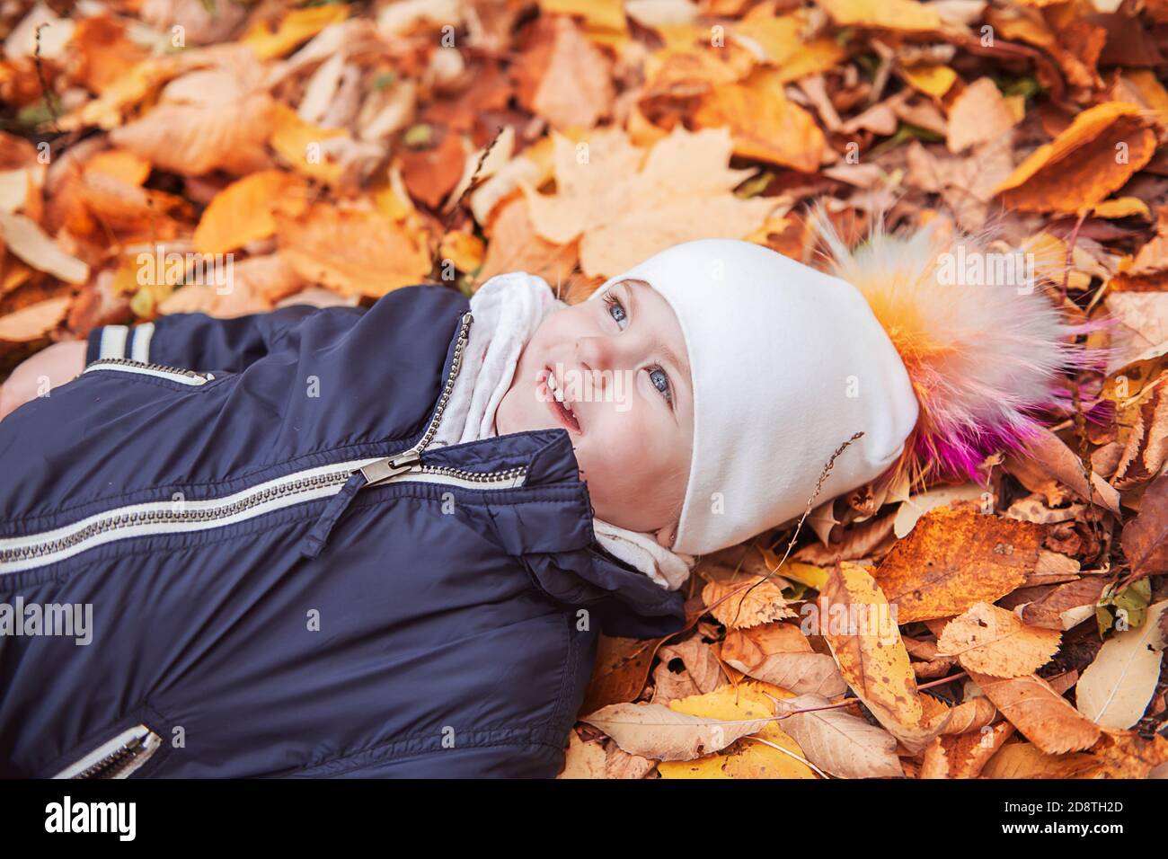portrait of child in the autumn season outside Stock Photo - Alamy