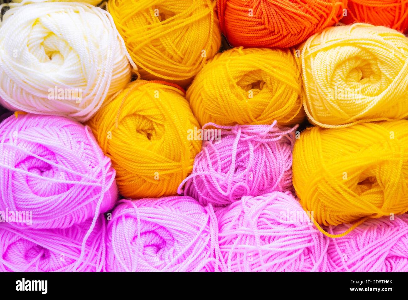 multi-colored bobbins of thread for knitting and Hobbies Stock Photo