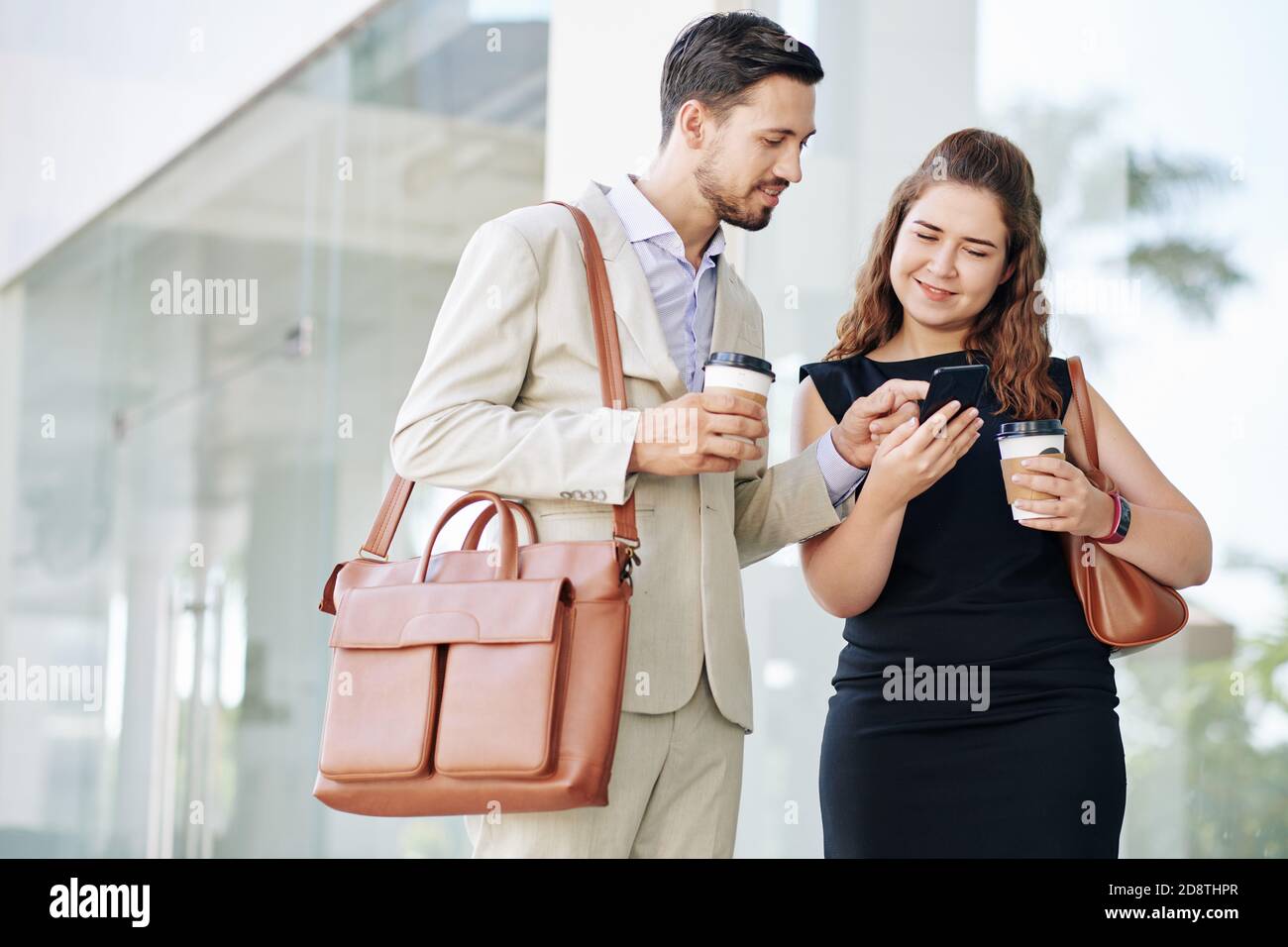 Business people discussing meme Stock Photo Alamy