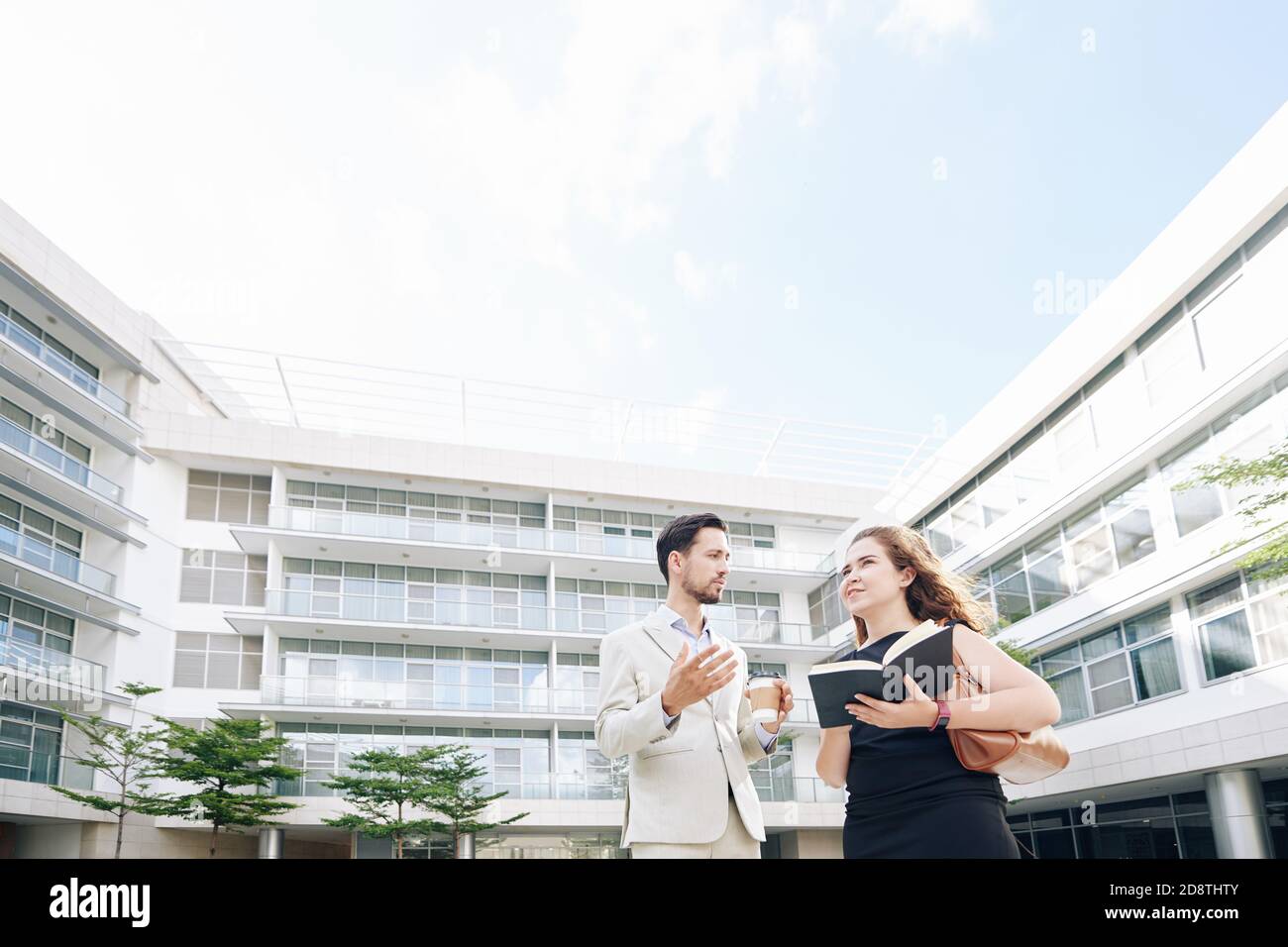 Colleagues discussing work Stock Photo