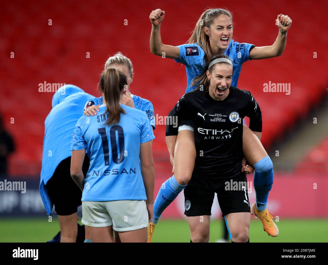 Manchester City's Janine Beckie (top right) celebrates with goalkeeper ...