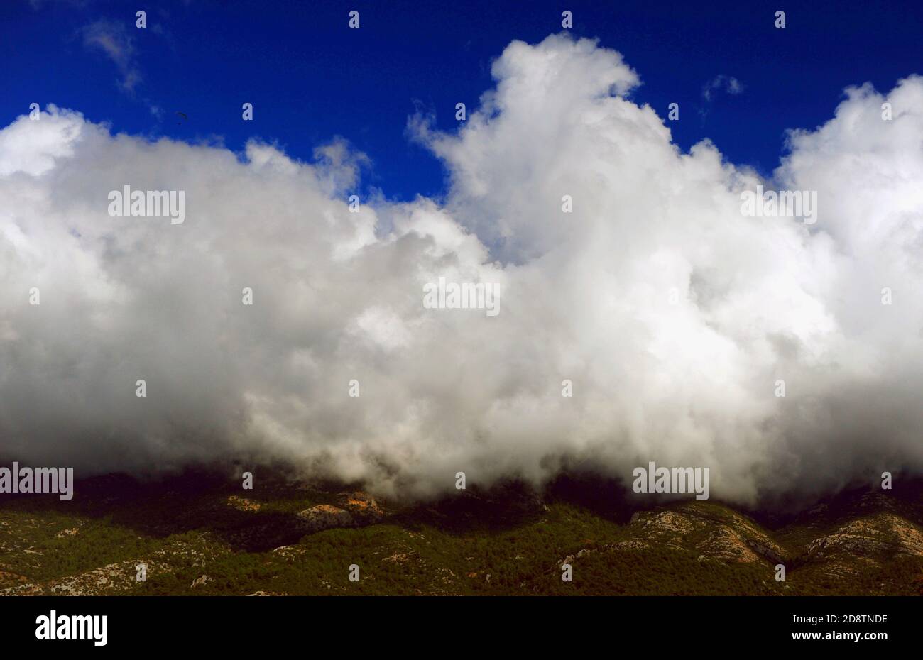 Beautiful and simultaneously mysterious blue big sky Stock Photo