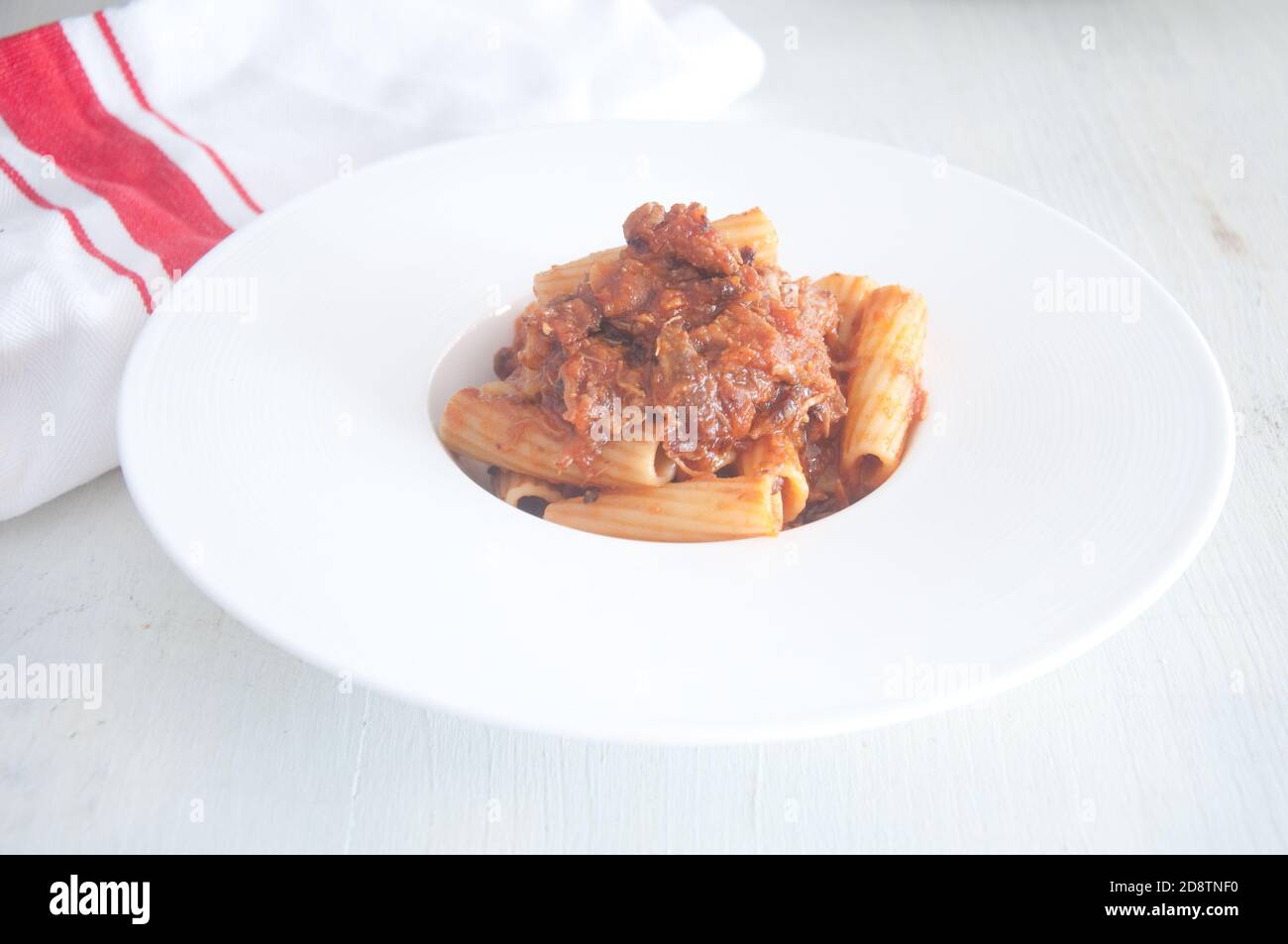 Pasta with beef Coda alla vaccinara, typical Roman recipe Stock Photo