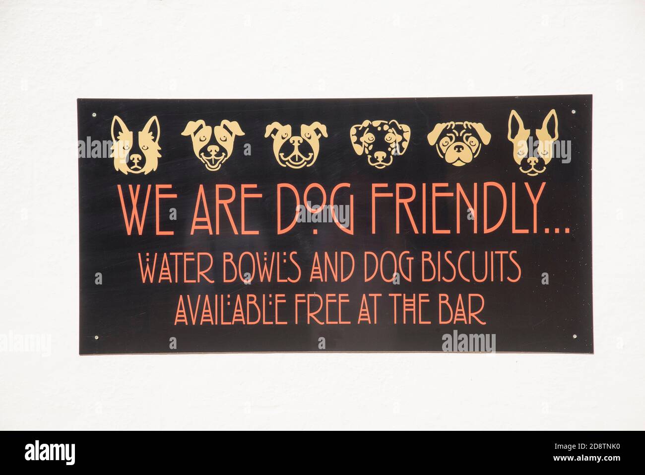 England, UK. 2020.  Dog friendly pub sign on the wall of a pub. Stock Photo