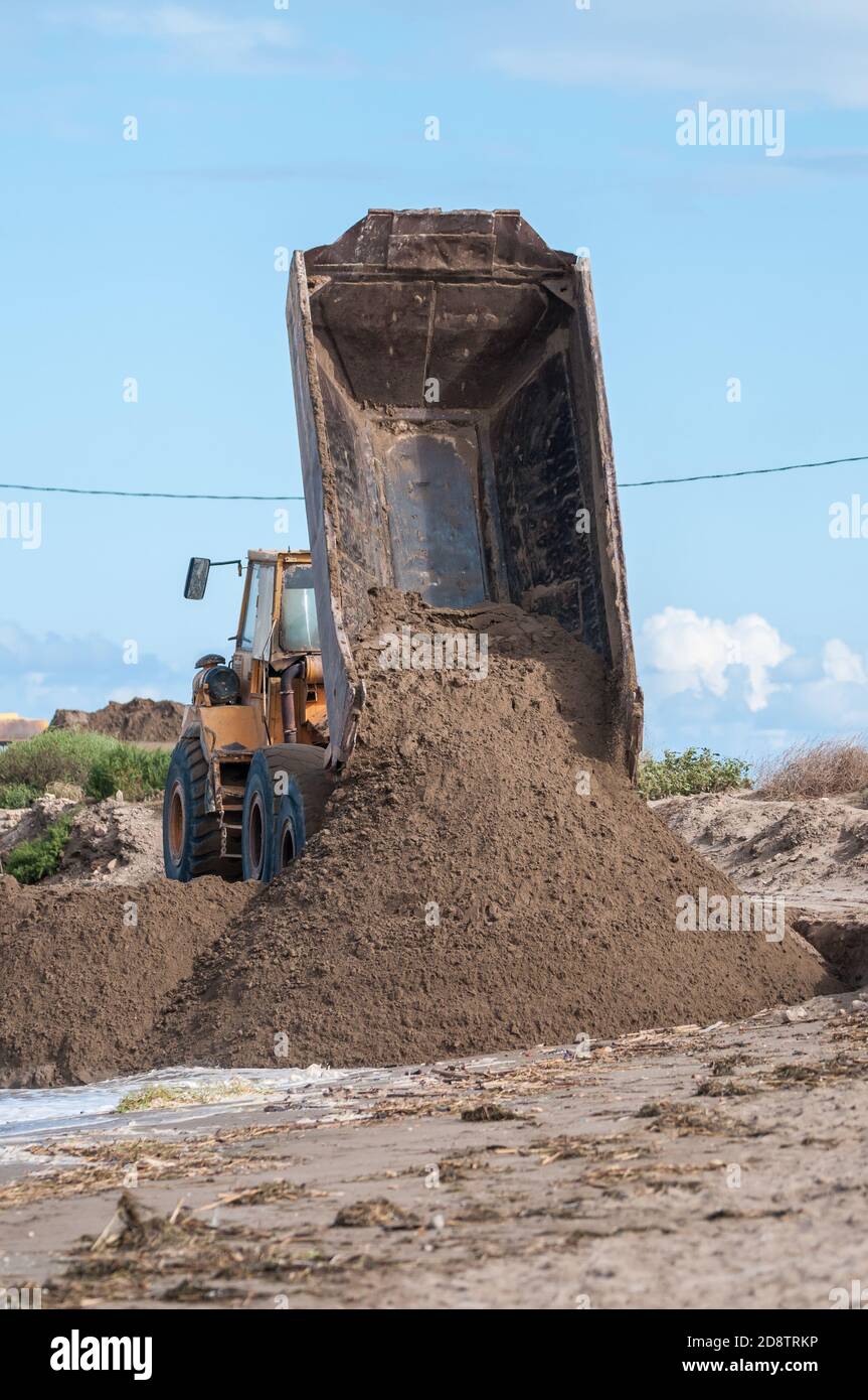 Dump truck unloading sand hires stock photography and images Alamy