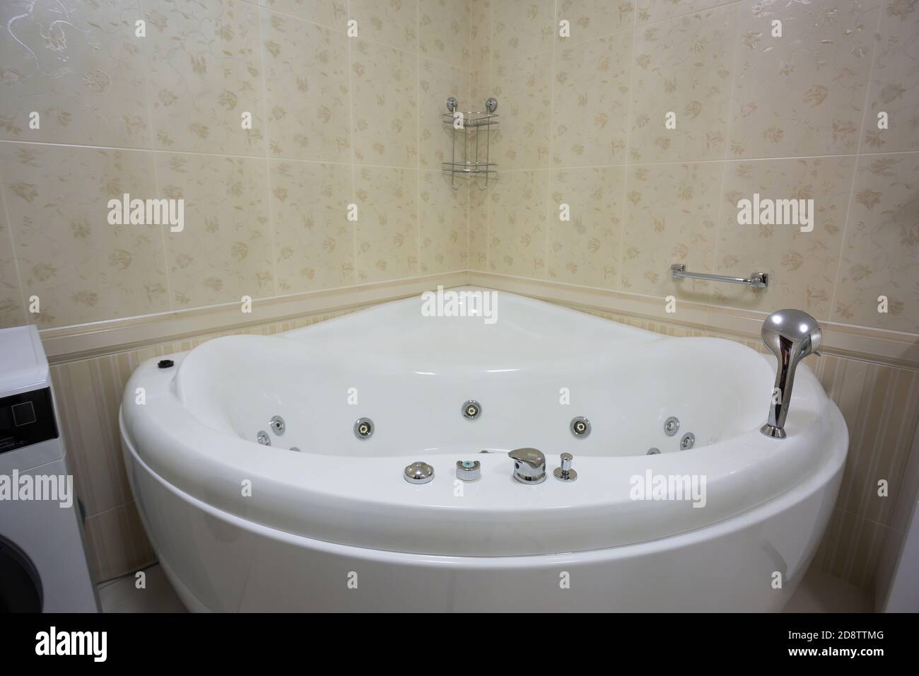 Modern bathroom with jacuzzi bath Stock Photo Alamy