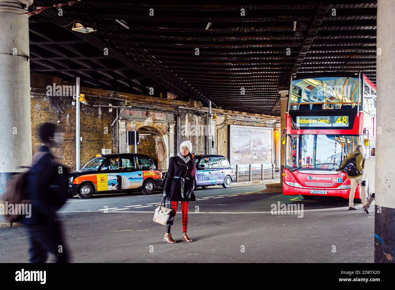 London, UK, December 7, 2013: passersby near London Bridge Station Stock Photo