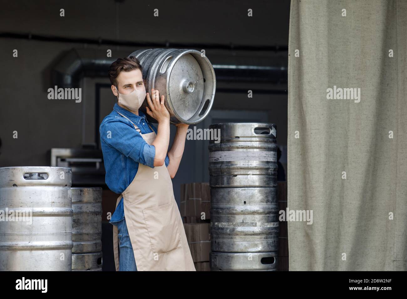 Industrial production of craft beer during covid-19 pandemic and new normal Stock Photo