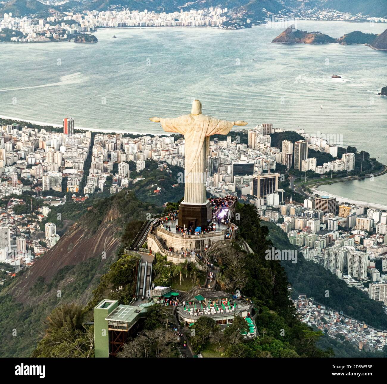 Cristo Redentor statue in Rio de Janeiro (aerial shot made from a helicopter) during a spectacular sunset Stock Photo