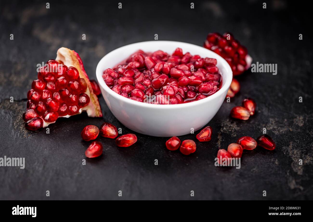 Some fresh preserved Pomegranate seeds (selective focus; close-up shot) Stock Photo
