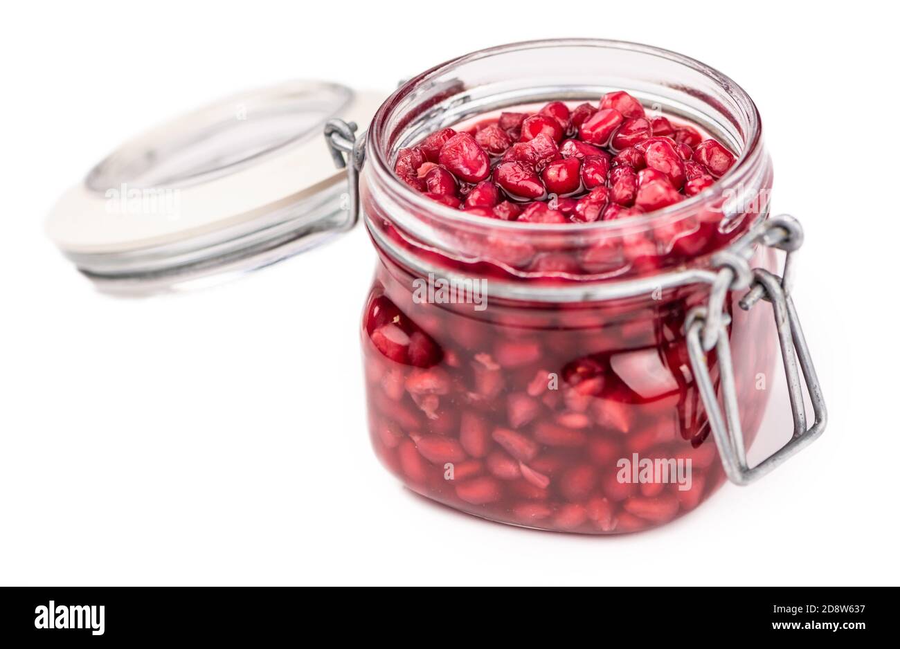 preserved Pomegranate seeds as detailed close-up shot isolated on white background (selective focus) Stock Photo