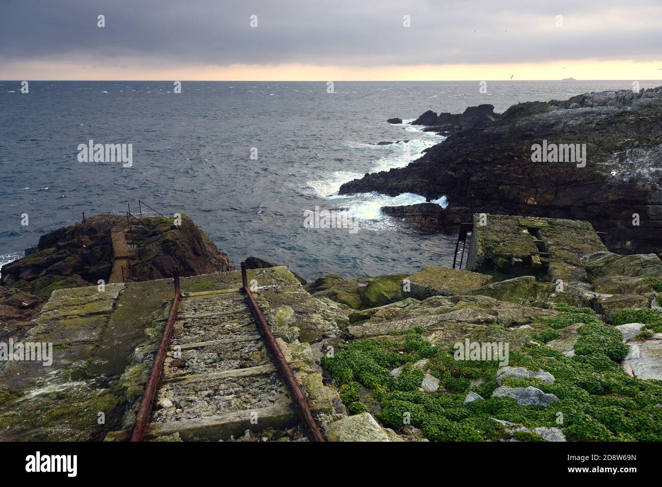 Old landing stage at Sule Skerry lighthouse Stock Photo