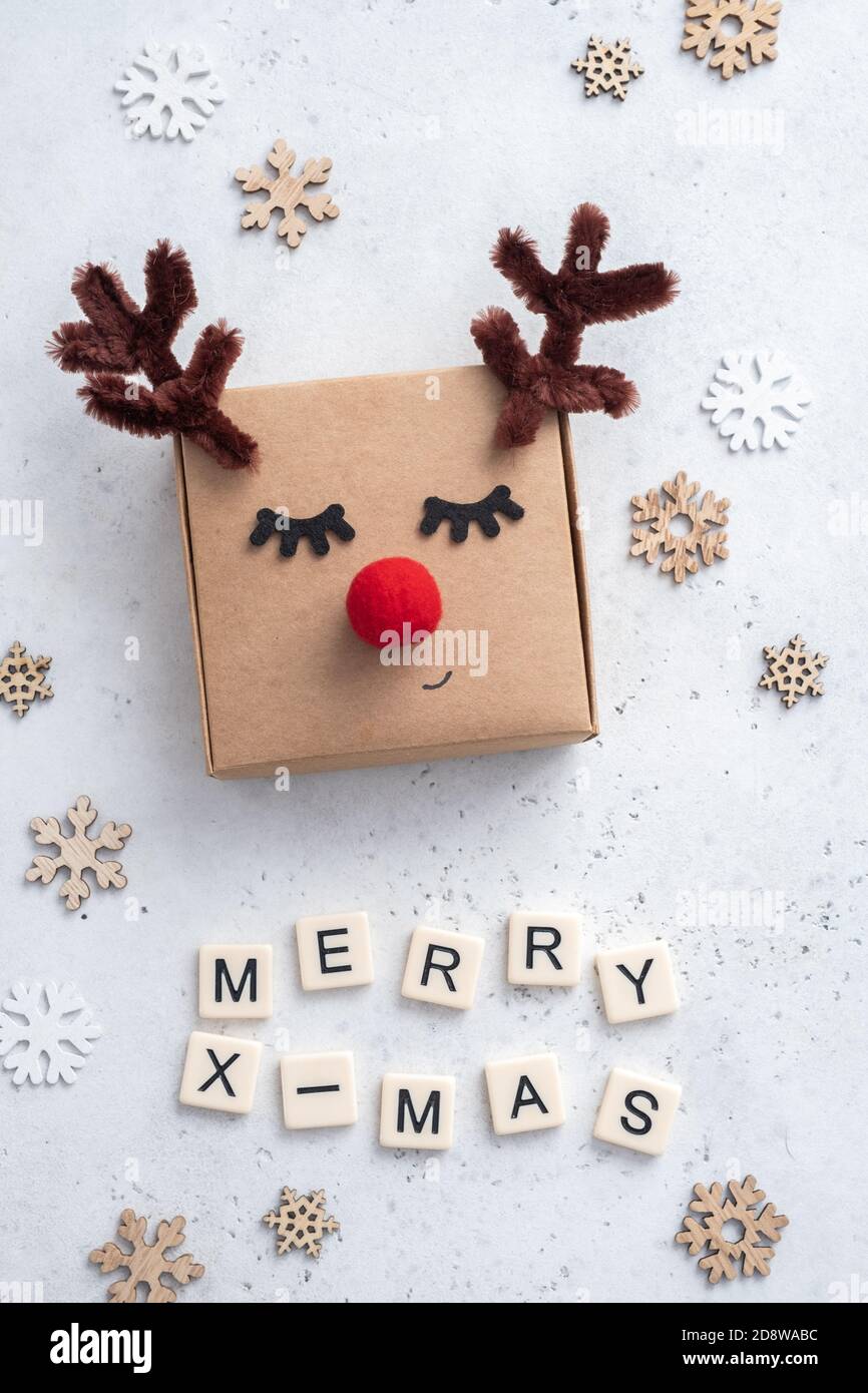 Christmas and New Year holiday concept. Deer gift box Stock Photo
