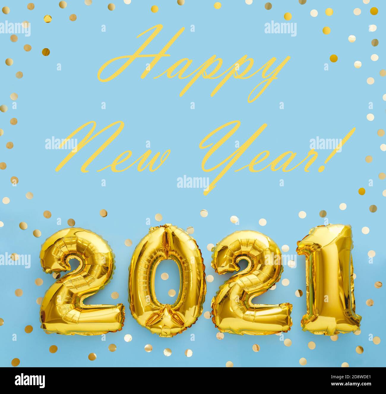 Happy New year text with gold foil balloons 2021 on blue background with confetti. New Year eve invitation 2021. Square flat lay Stock Photo