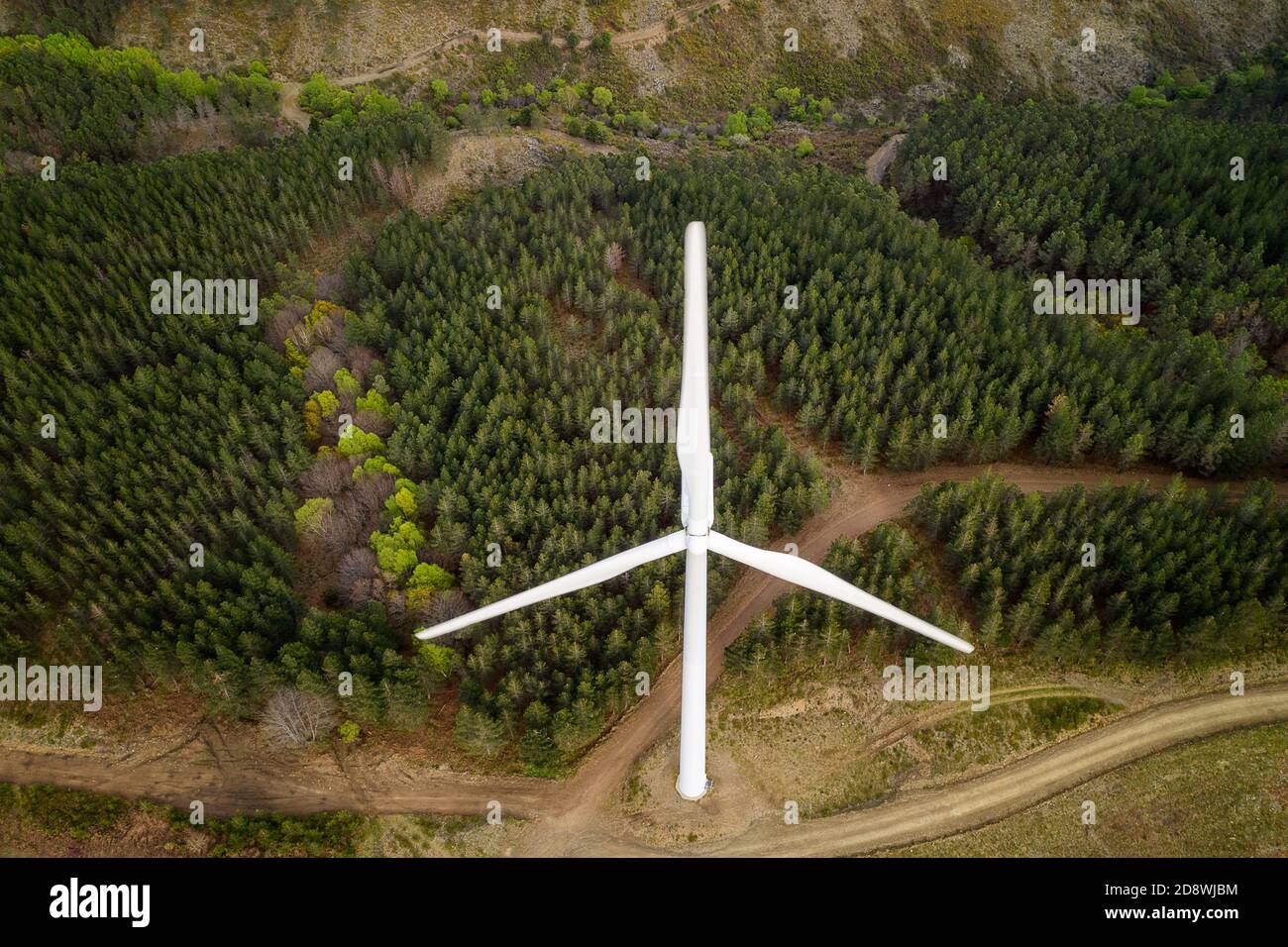 Wind turbines drone aerial view renewable energy on the middle of clouds in Serra da Lousa, Portugal Stock Photo