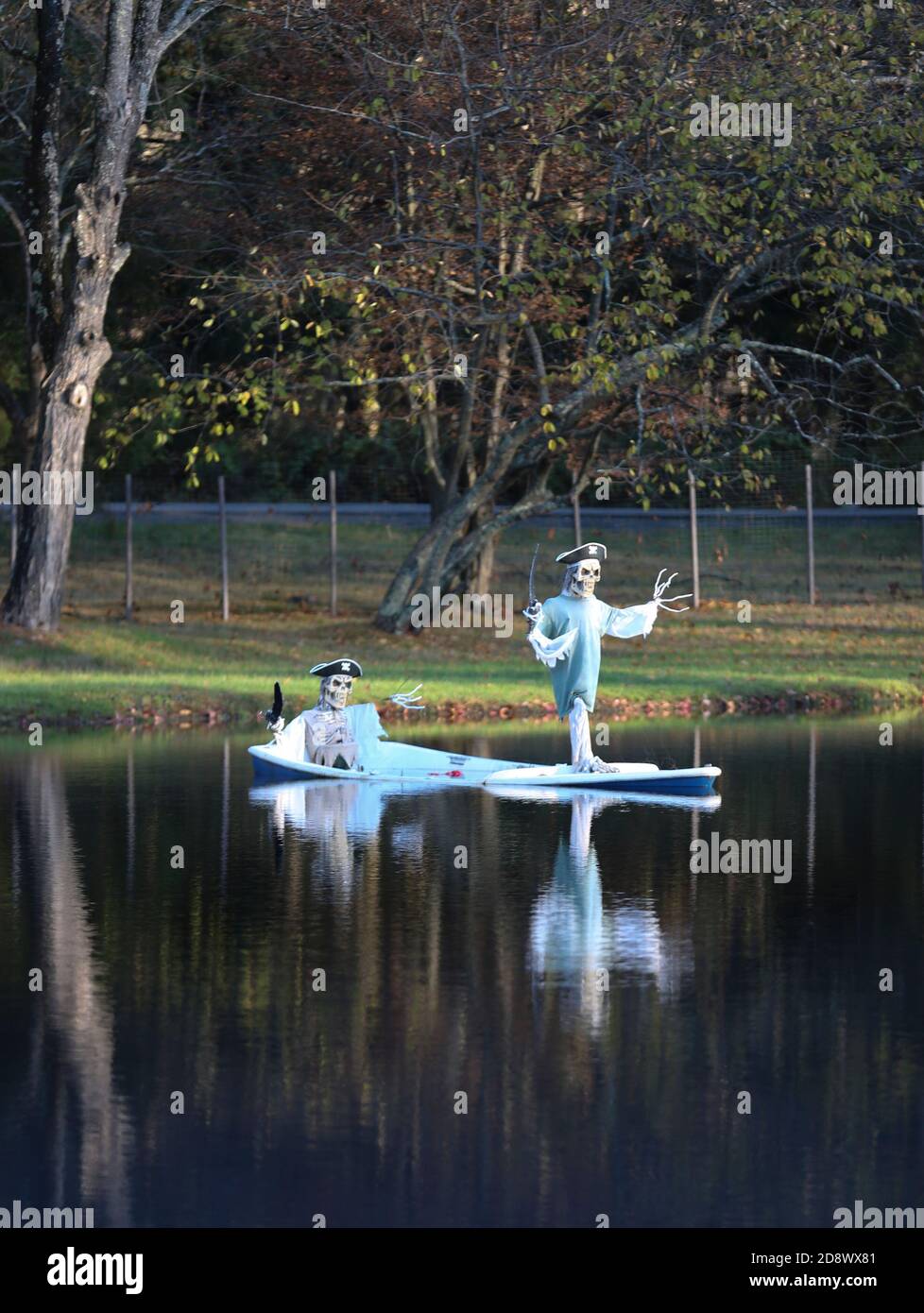 Pirate figures in a pond at Halloween time Stock Photo