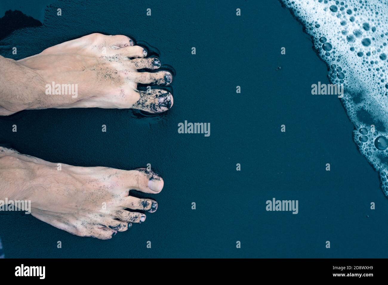 Male feet walking on sand hi-res stock photography and images - Alamy