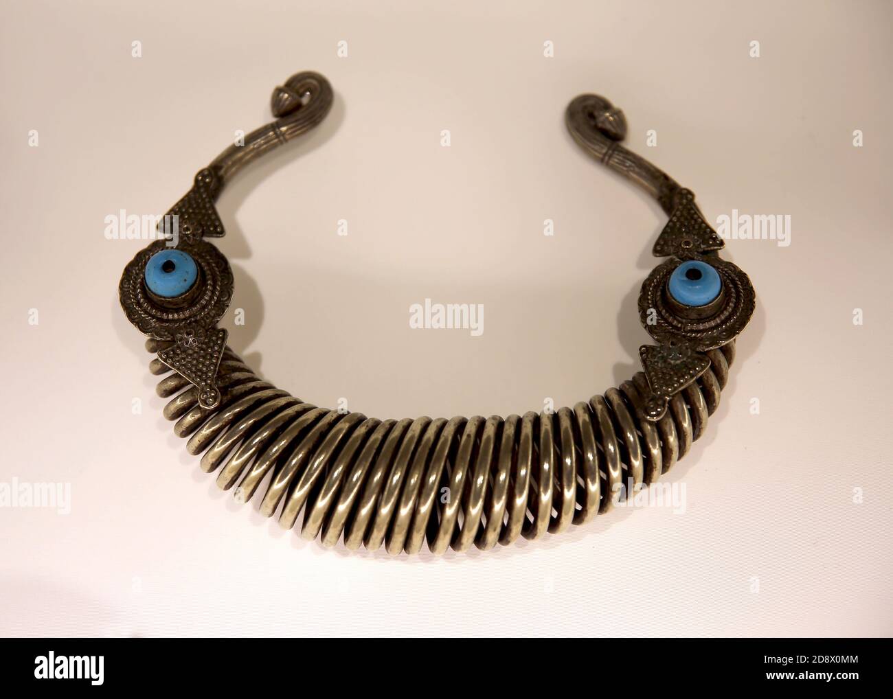 Gira or gre torque (torc). Nuristan, Afghanistan. 19th century. Silver with  turquoises. Museum of World Cultures. Barcelona, Spain. Stock Photo