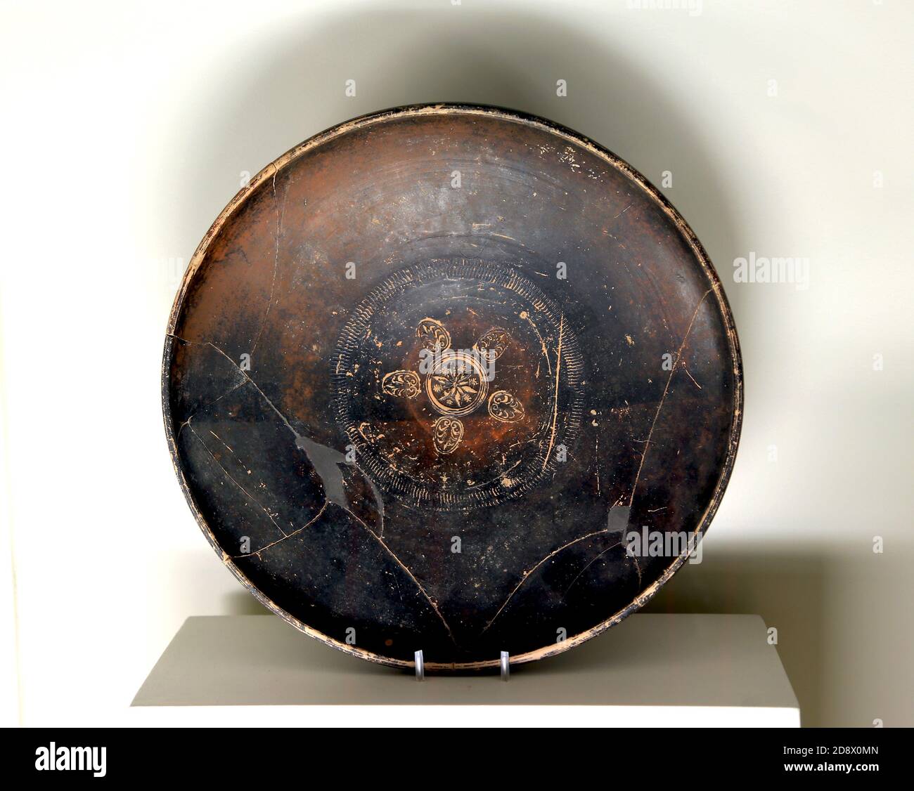 Black-gloss bowl. Roses workshop. (cent. 4th-3rd BC.) Greek pottery. Wheel made. Cabrera de Mar. Archaeology Museum of  Catalonia. Stock Photo