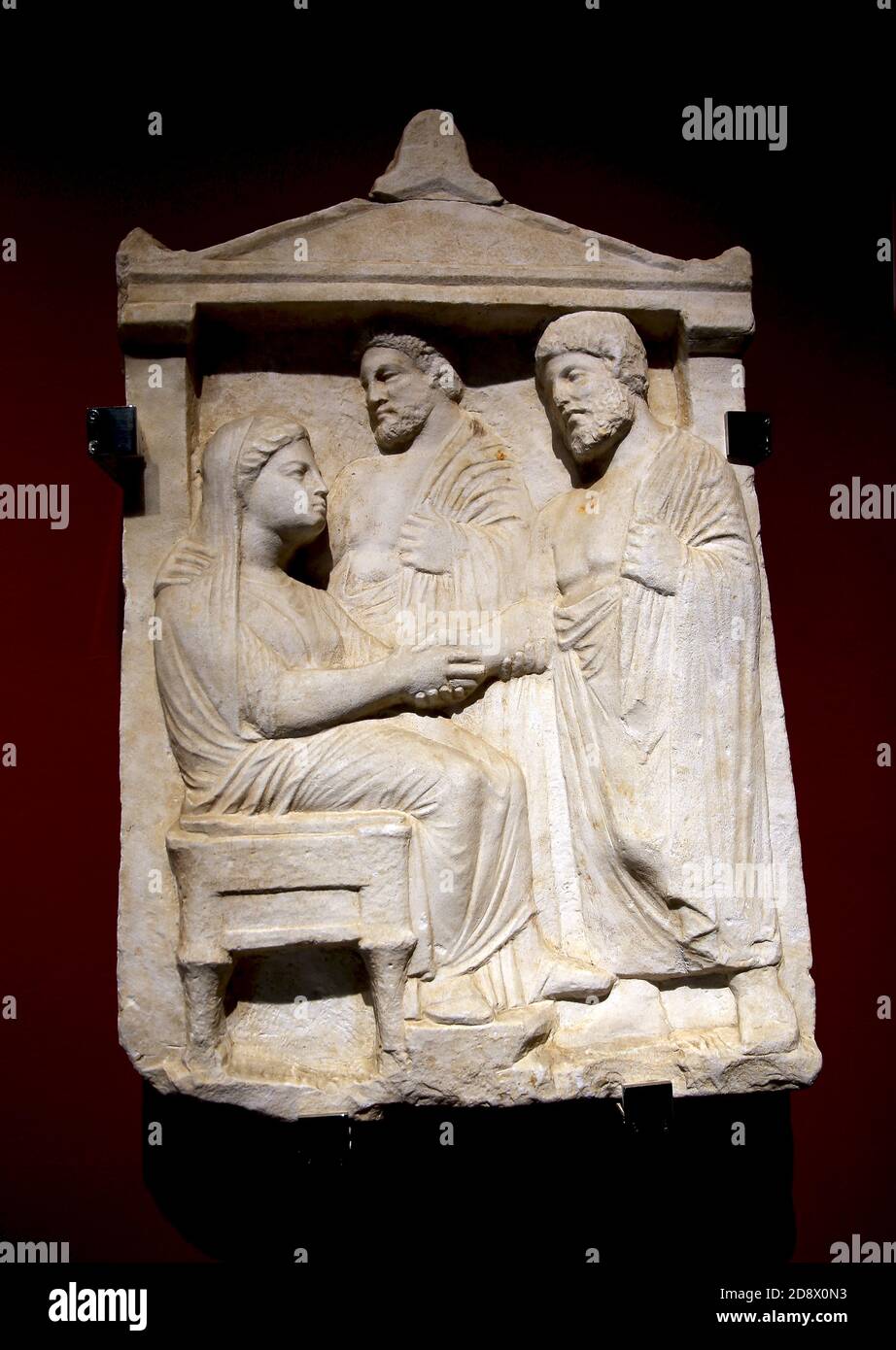 Greek funerary stele (4th century BC) Farewell scene. Greek culture. Marble, Attic workshop. Archeology Museum of Catalonia. Barcelona. Stock Photo