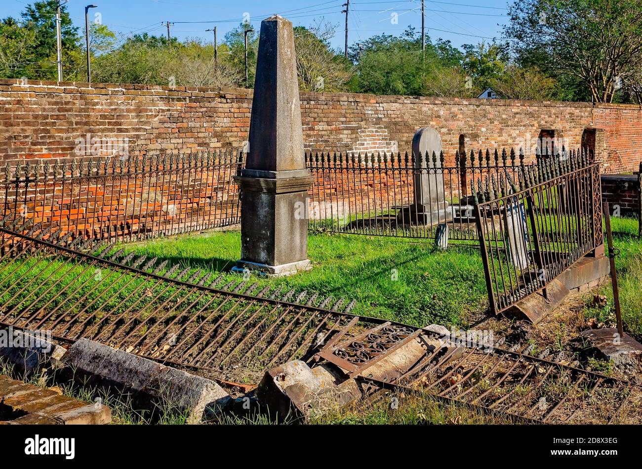 Headstones stand in Church Street Graveyard, Oct. 31, 2020, in Mobile