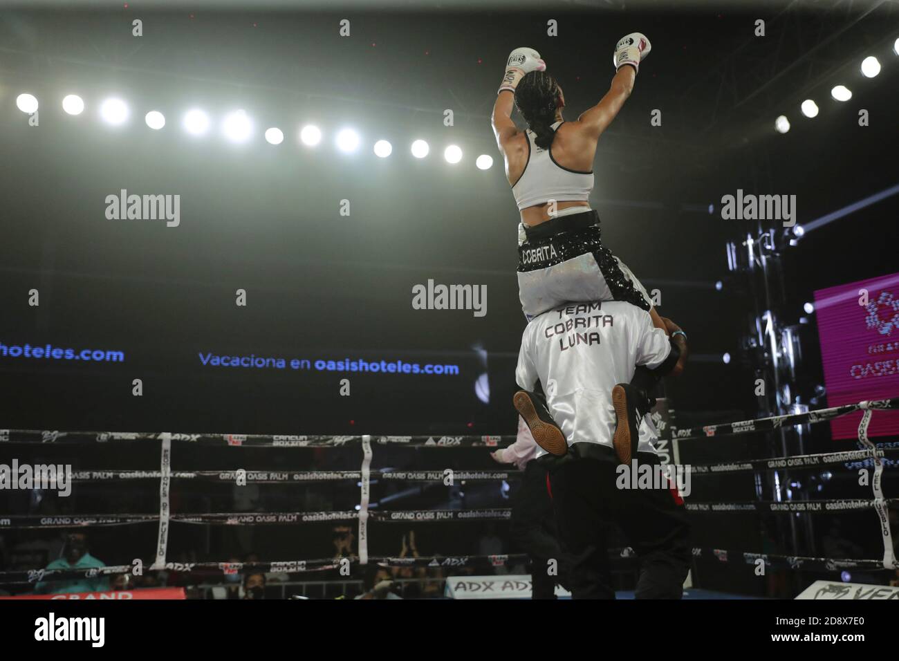 Cancun, Mexico. 01st Nov, 2020. CANCUN, MEXICO- NOVEMBER 1: Yuliahn Luna ' Cobrita' lifts her arms while celebrates her won of the WBC Bantamweight World Championship Fight between Barby Juarez and Yuliahn Luna at Oasis Arena Cancun on November 1, 2020 in Cancun, Mexico. Credit: Rodolfo Flores/Eyepix Group/The Photo Access Credit: The Photo Access/Alamy Live News Stock Photo