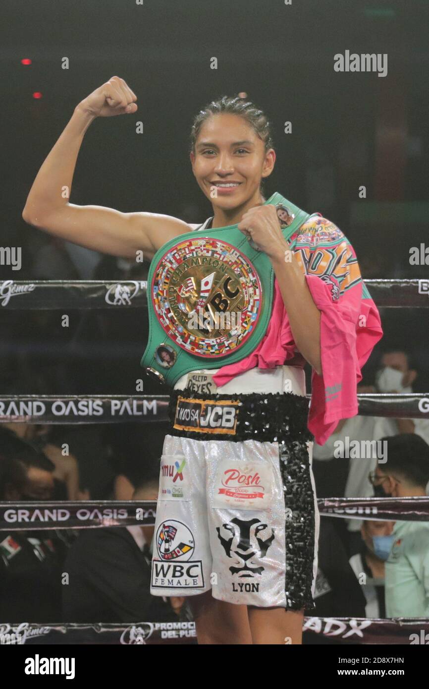 Cancun, Mexico. 01st Nov, 2020. CANCUN, MEXICO- NOVEMBER 1: Yuliahn Luna ' Cobrita' lifts her arms while celebrates her won of the WBC Bantamweight World Championship Fight between Barby Juarez and Yuliahn Luna at Oasis Arena Cancun on November 1, 2020 in Cancun, Mexico. Credit: Rodolfo Flores/Eyepix Group/The Photo Access Credit: The Photo Access/Alamy Live News Stock Photo