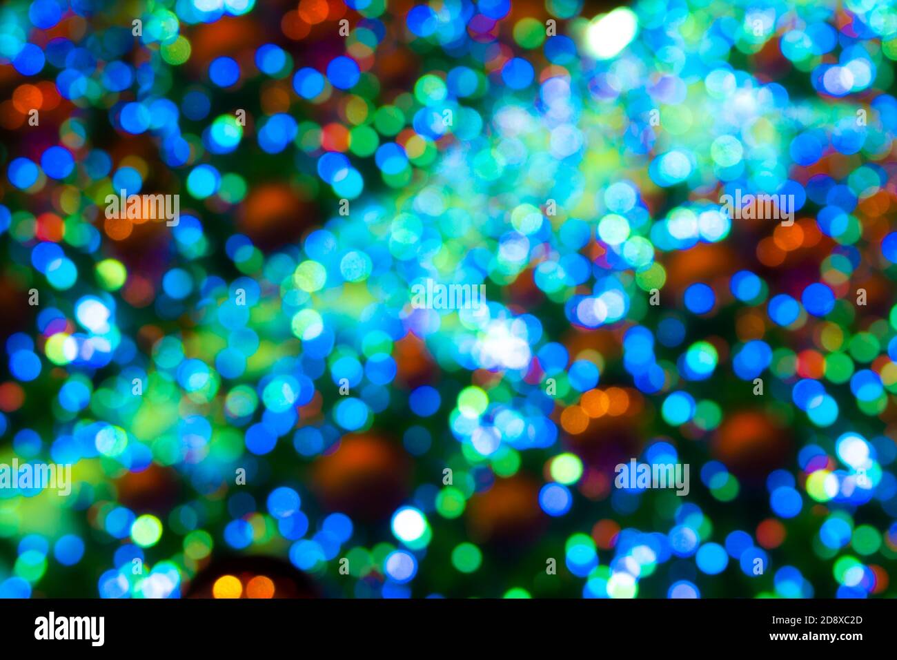 blurred colored spots of green hue, unfocused background Stock Photo
