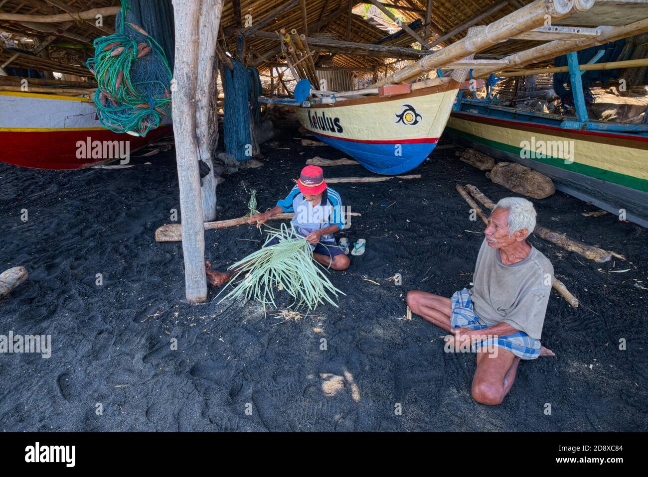 fishing indonesian style at a popular rural village man made pool near  malang java indonesia Stock Photo - Alamy