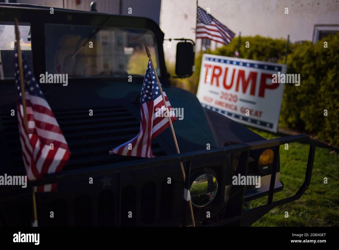 Jeep vehicle proudly displays American Flags and Trump signs in support of Constitution, Second Amendment, during Trump rally, Montoursville PA. USA. Stock Photo