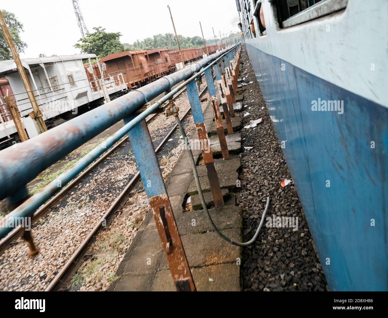 Closeup shot of rustic metal railings in a train station Stock Photo