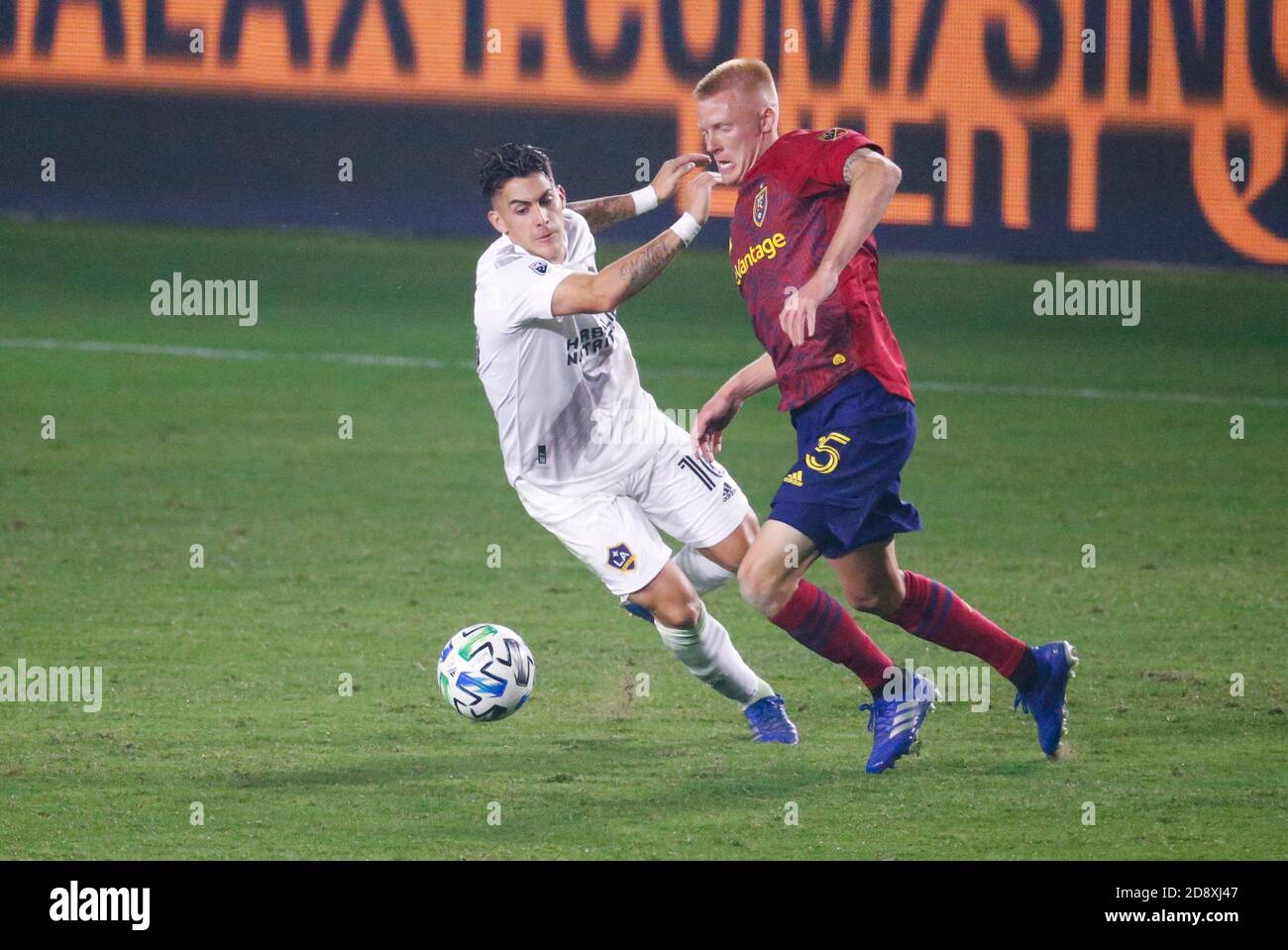 Carson, California, USA. 1st Nov, 2020. LA Galaxy forward Cristian Pavon (10) of Argentina, vies against Real Salt Lake midfuelder Kyle Beckerman (5) during an MLS soccer match between the LA Galaxy and the Real Salt Lake Sunday, Nov. 1, 2020, in Carson, Calif. Credit: Ringo Chiu/ZUMA Wire/Alamy Live News Stock Photo