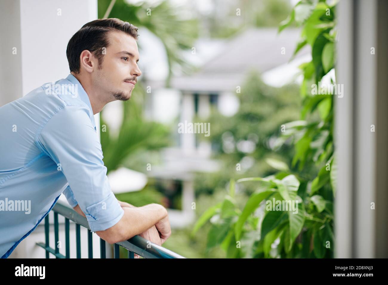 Pensive young handsome Stock Photo