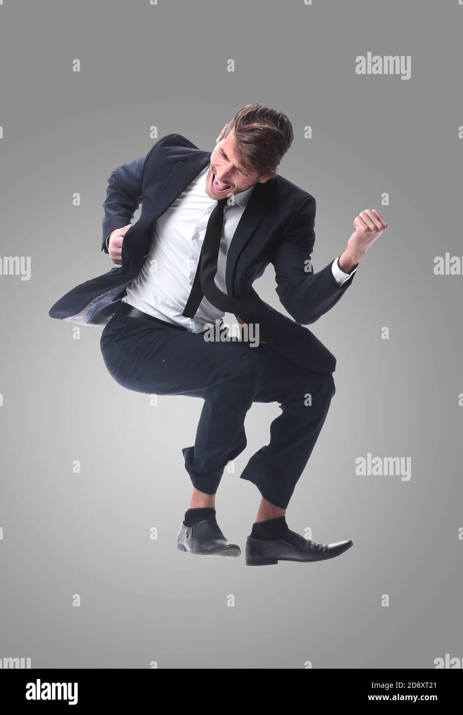 in full growth. happy young businessman. isolated on white Stock Photo ...