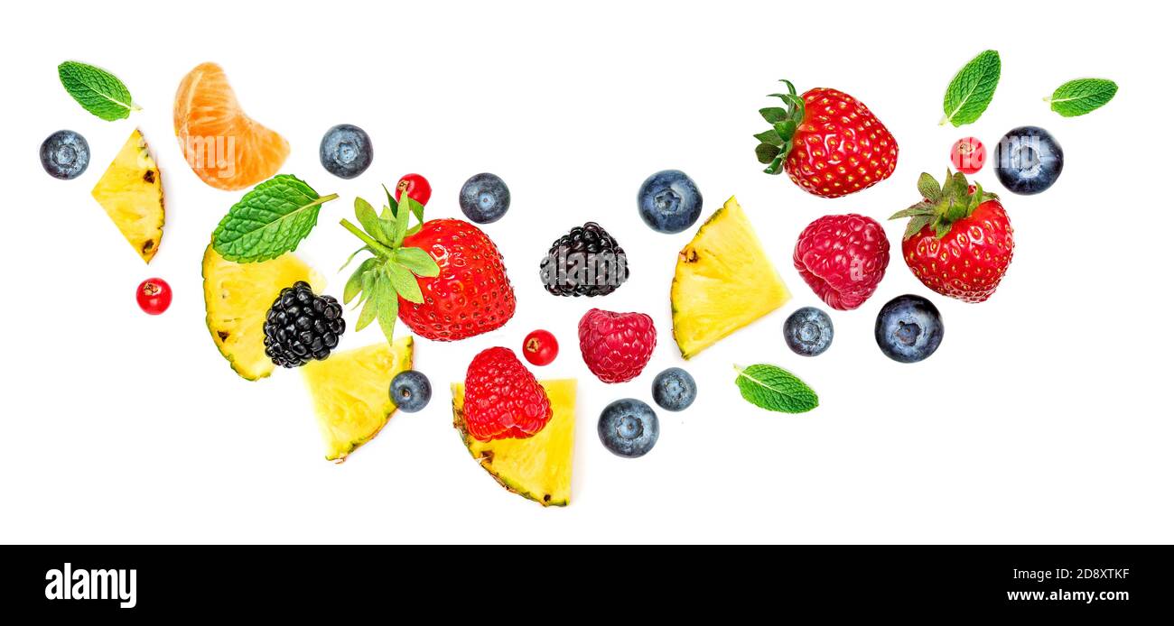 Creative layout made of summer fruits and mixed berries isolated on white background. Flat lay. Food concept. Stock Photo