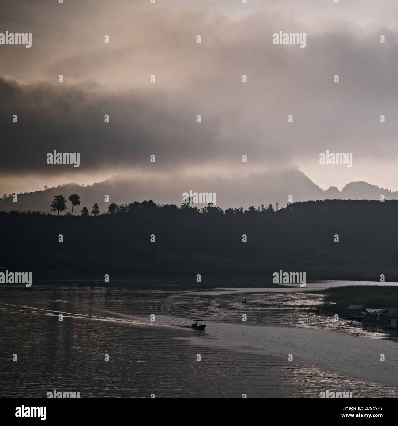 The lake at morning fog in Sangkhla Buri, Thailand Stock Photo