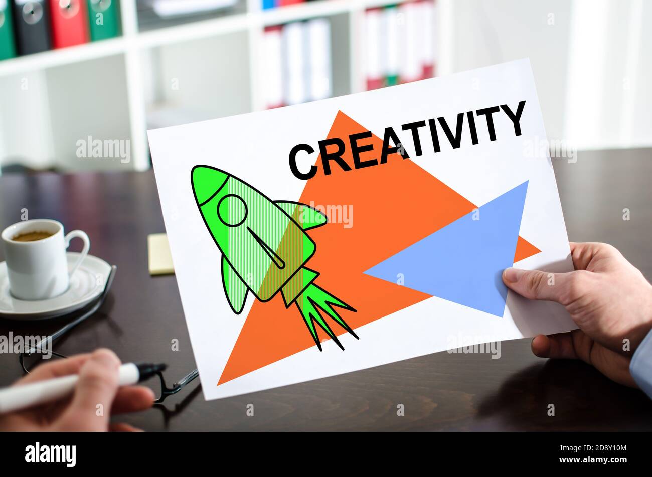 Hand holding paper rocket hi-res stock photography and images - Alamy