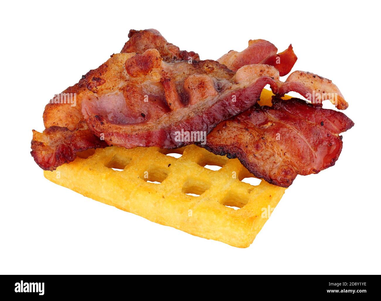 Streaky smoked bacon rashers on a grilled potato waffle isolated on a white background Stock Photo