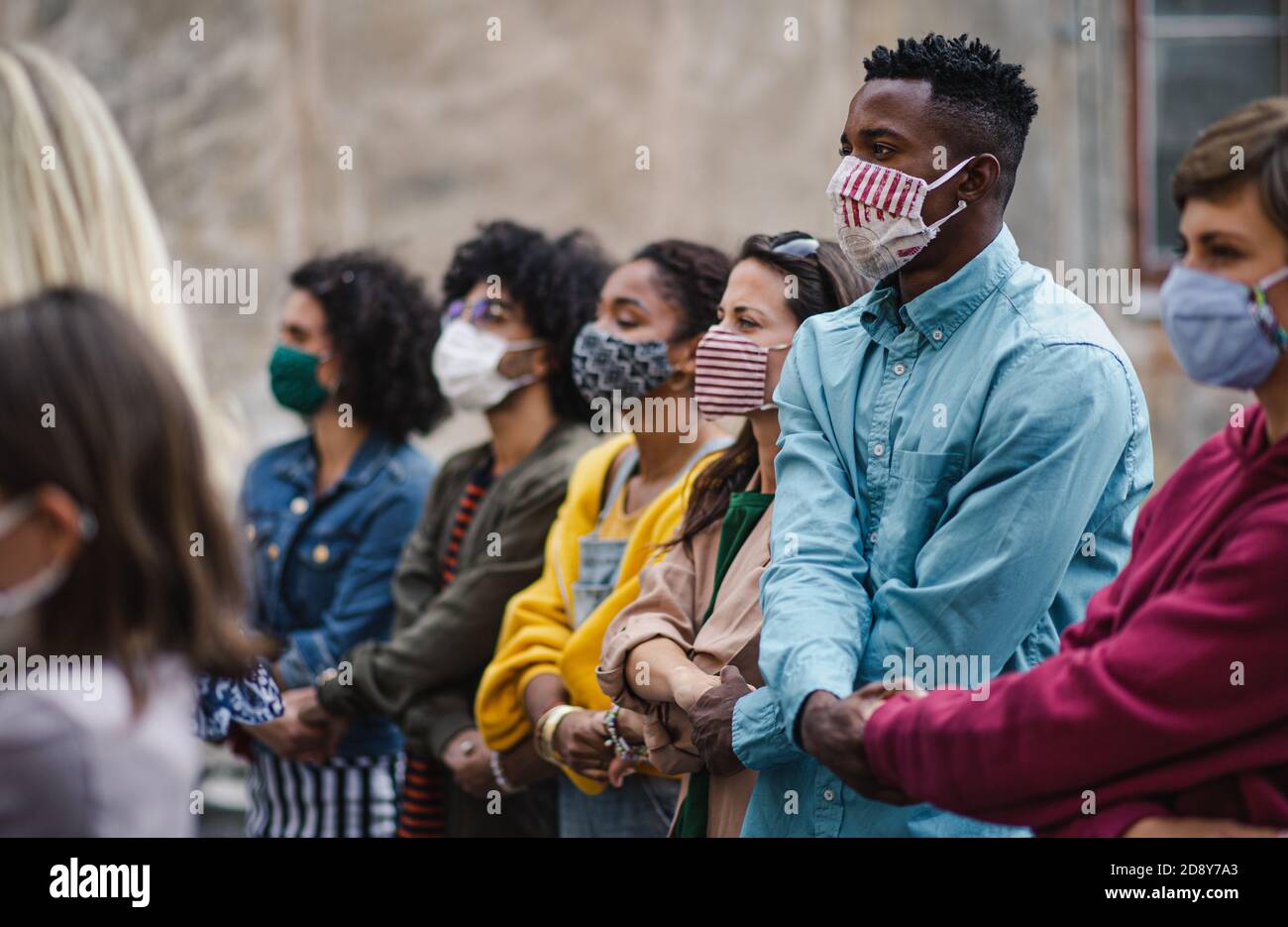 Group of people activists protesting on streets, march and ...